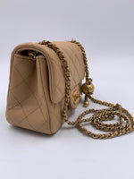 CHANEL Beige Lambskin Mini Square Pearl Crush Flap Bag