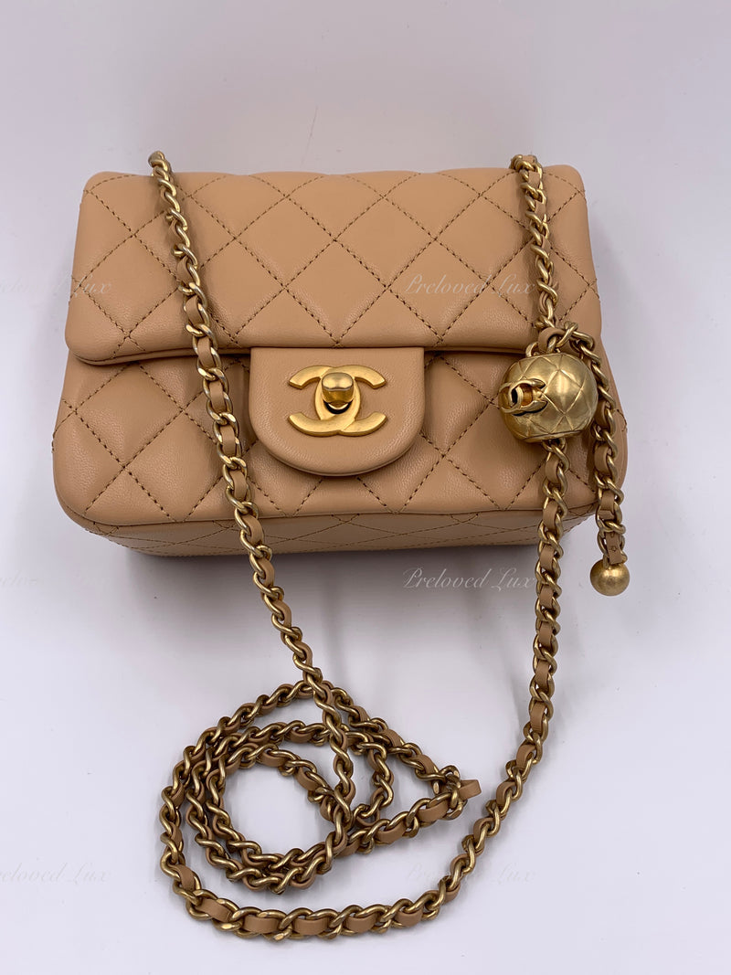 CHANEL Beige Lambskin Mini Square Pearl Crush Flap Bag