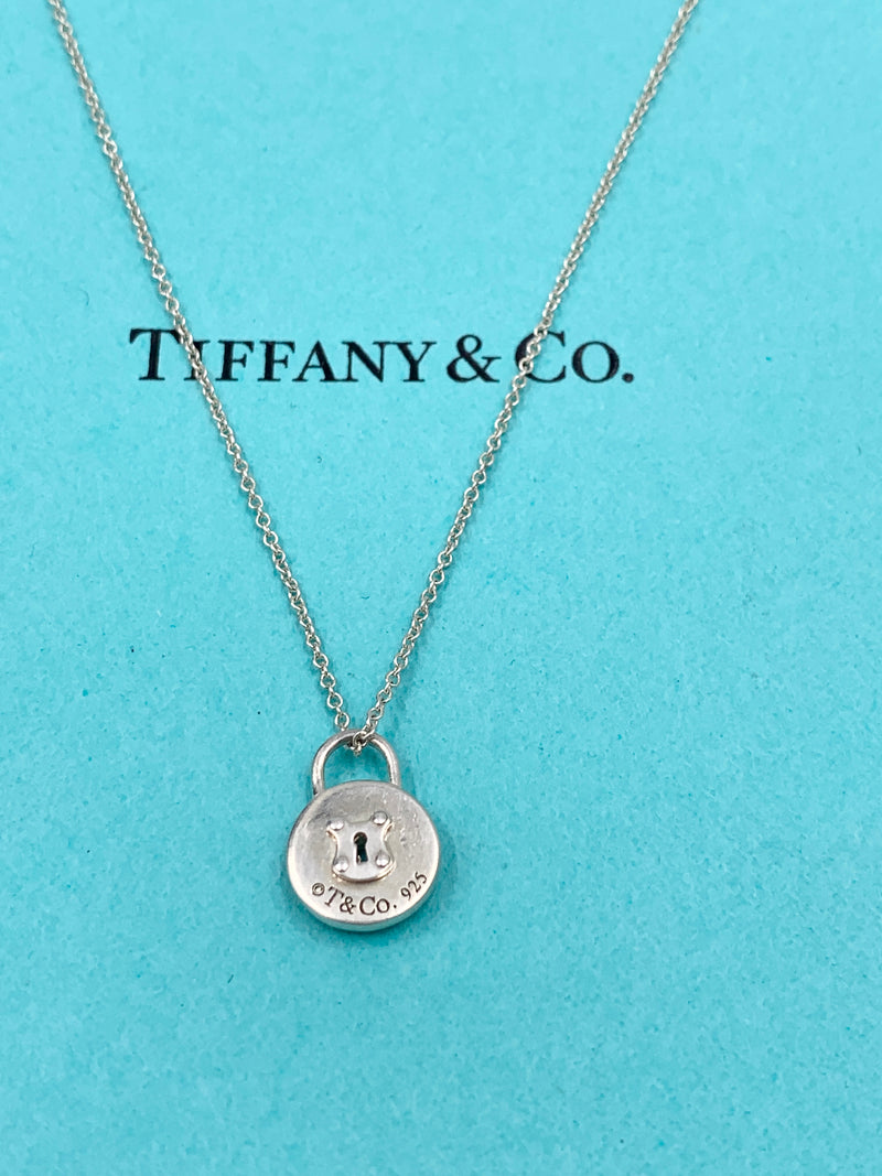 Sold-Tiffany 
Co 925 Silver Pad Lock Necklace