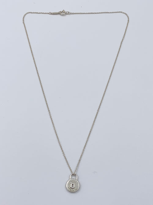 Sold-Tiffany 
Co 925 Silver Pad Lock Necklace