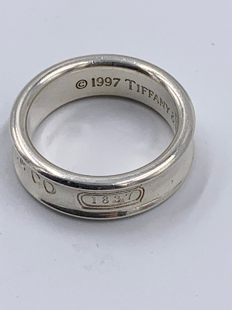 Sold-Tiffany 
Co 925 Silver 1837 Medium Ring Size 9