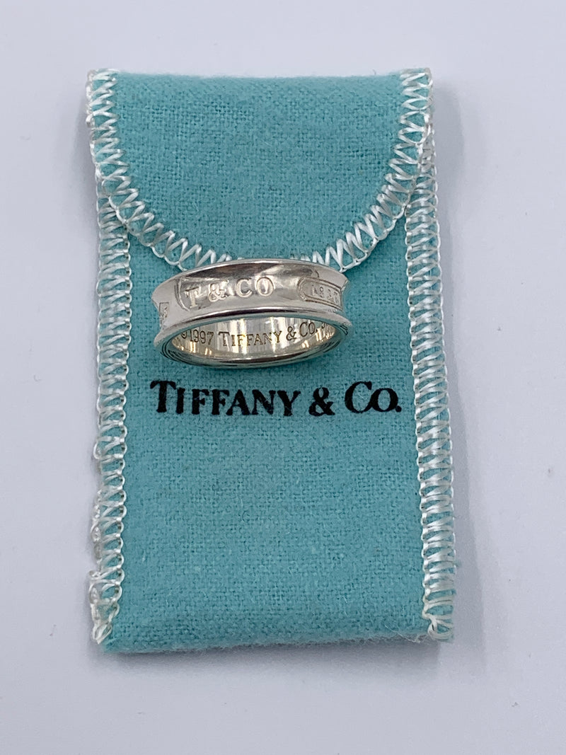 Sold-Tiffany 
Co 925 Silver 1837 Medium Ring Size 9