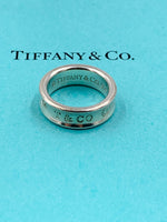 Sold-Tiffany 
Co 925 Silver 1837 Medium Ring Size 6