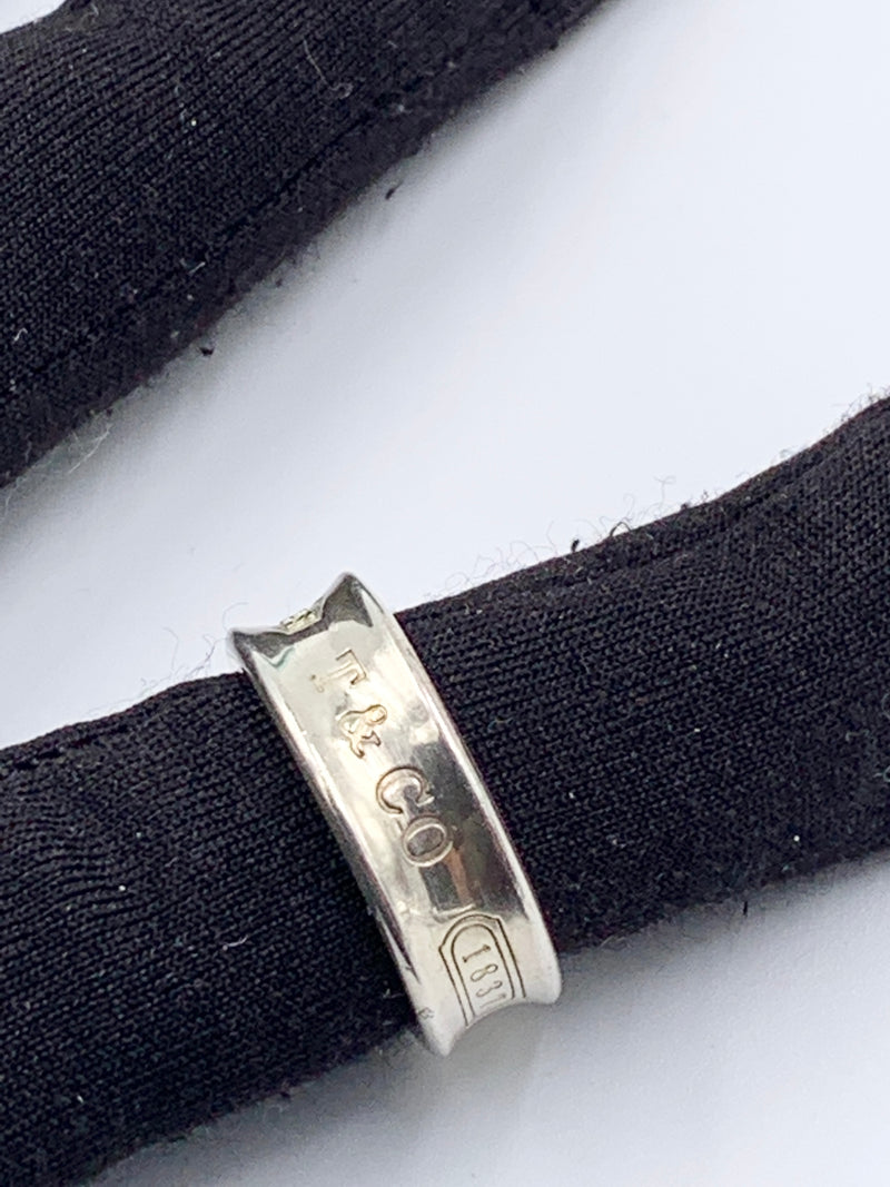 Sold-Tiffany 
Co 925 Silver 1837 Medium Ring Size 6