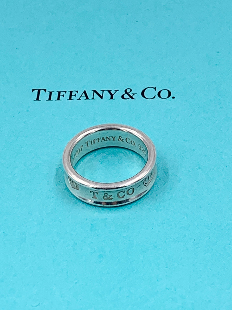 Sold-Tiffany 
Co 925 Silver 1837 Medium Ring Size 8