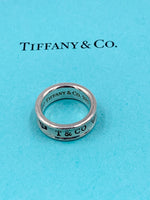 Sold-Tiffany 
Co 925 Silver 1837 Medium Ring Size 5.75