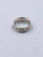 Sold-Tiffany 
Co 925 Silver 1837 Medium Ring Size 5.75