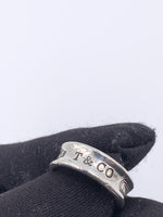 Sold-Tiffany 
Co 925 Silver 1837 Medium Ring Size 5.75