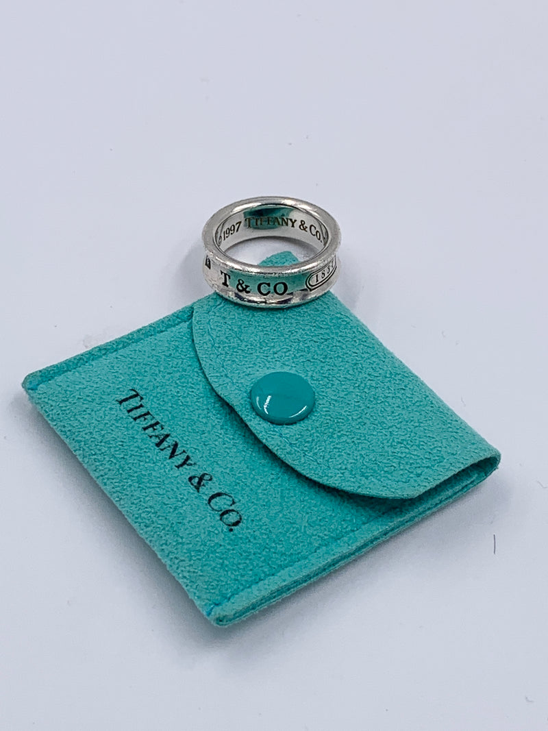 Sold-Tiffany 
Co 925 Silver 1837 Medium Ring Size 5.75