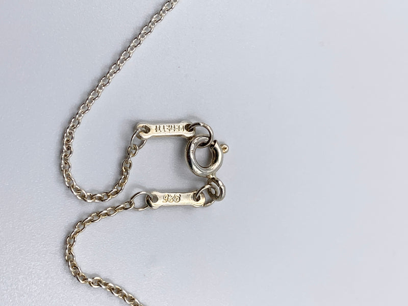 Sold-Tiffany 
Co 925 Elsa Peretti Silver Cross Necklace