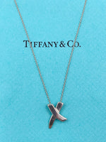 Sold-Tiffany 
Co 925 Silver Paloma Picasso X Kiss Small Size Pendant Necklace