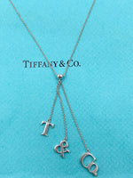 Sold-Tiffany 
Co 925 Silver T&CO Letters Lariat Necklace