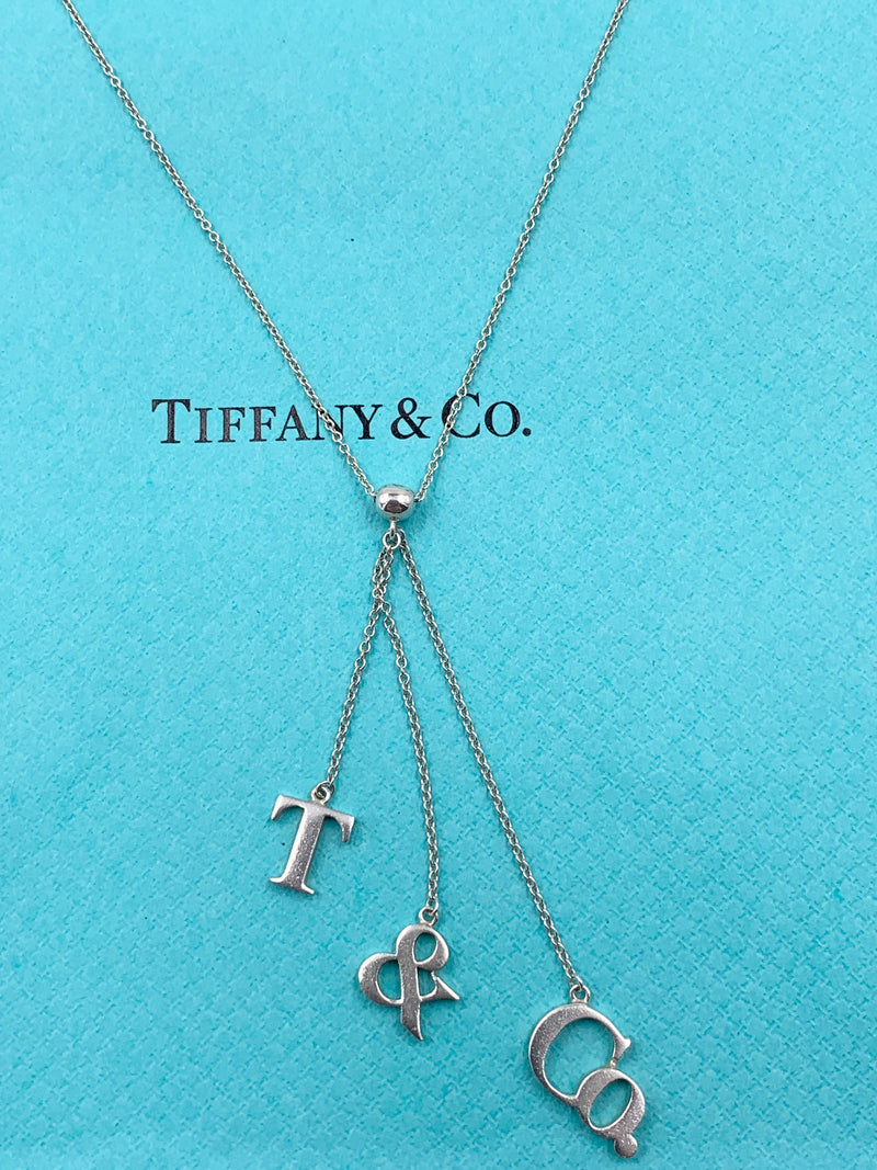 Sold-Tiffany 
Co 925 Silver T&CO Letters Lariat Necklace