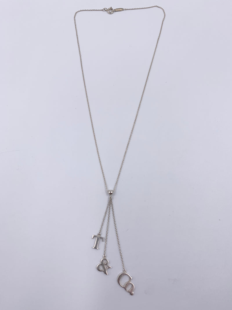 Sold-Tiffany 
Co 925 Silver T&CO Letters Lariat Necklace