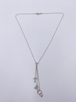 Sold-Tiffany 
Co 925 Silver T&CO Letters Lariat Necklace