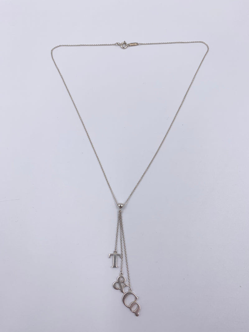 Sold-Tiffany 
Co 925 Silver T&CO Letters Lariat Necklace