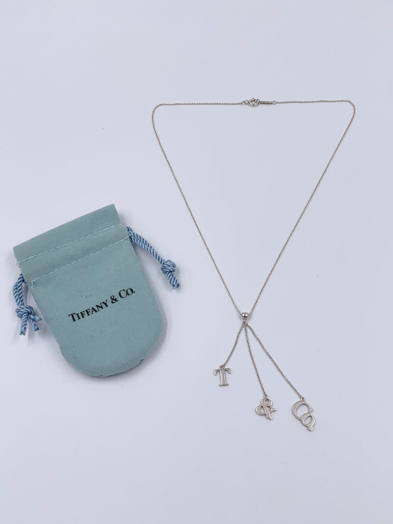 Sold-Tiffany 
Co 925 Silver T&CO Letters Lariat Necklace