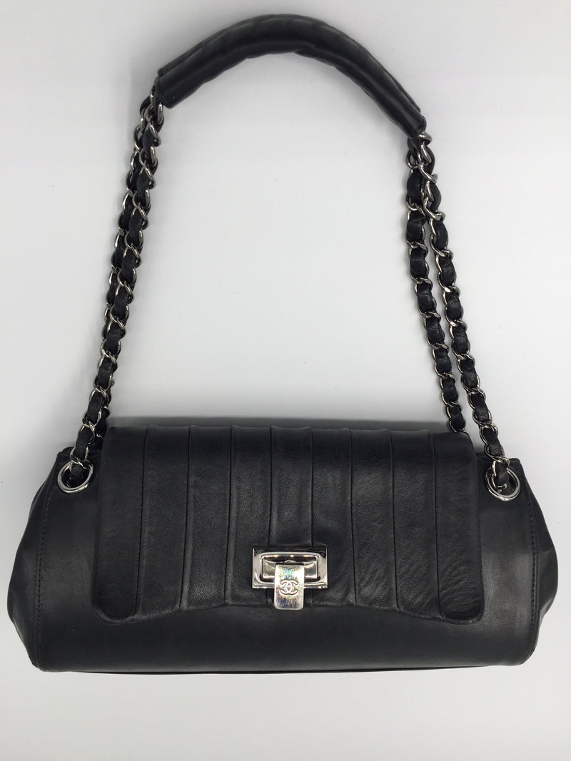 Sold-CHANEL East-West Accordion Flap bag black