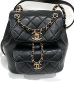 CHANEL Black lambskin Mini Duma Drawstring Backpack / Gold Hardware