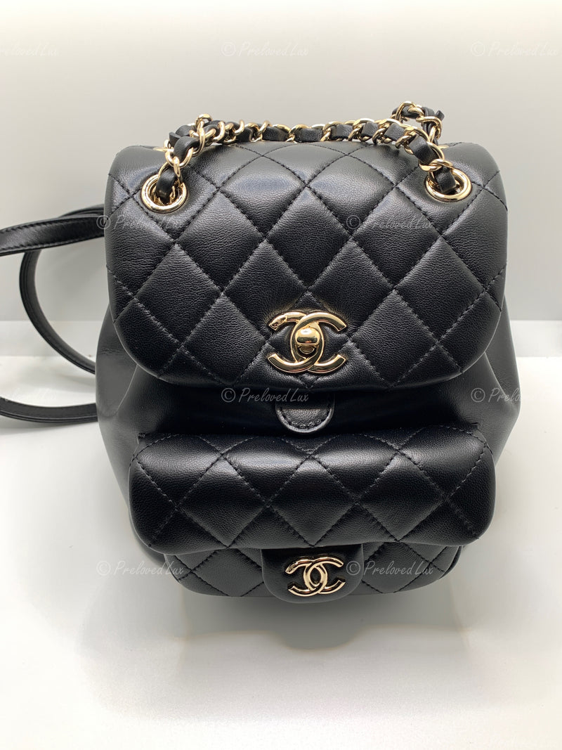 CHANEL Black lambskin Mini Duma Drawstring Backpack / Gold Hardware