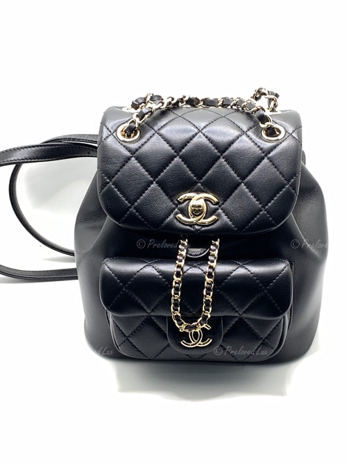 CHANEL Black lambskin Mini Duma Drawstring Backpack / Gold Hardware