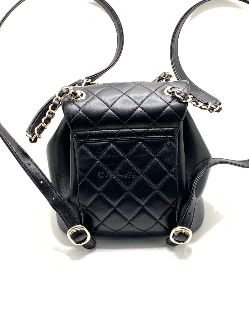 CHANEL Black lambskin Mini Duma Drawstring Backpack / Gold Hardware