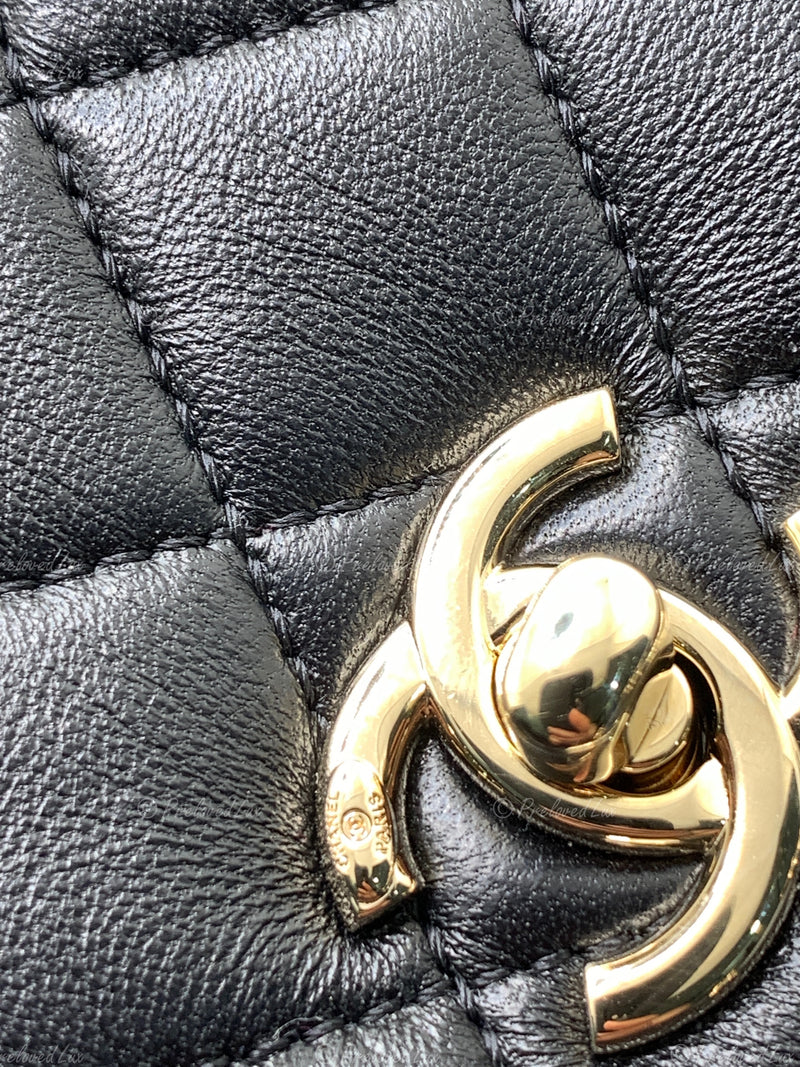 CHANEL Black lambskin Mini Duma Drawstring Backpack / Gold Hardware