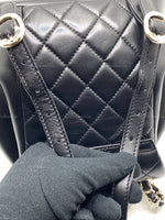 CHANEL Black lambskin Mini Duma Drawstring Backpack / Gold Hardware