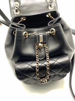 CHANEL Black lambskin Mini Duma Drawstring Backpack / Gold Hardware