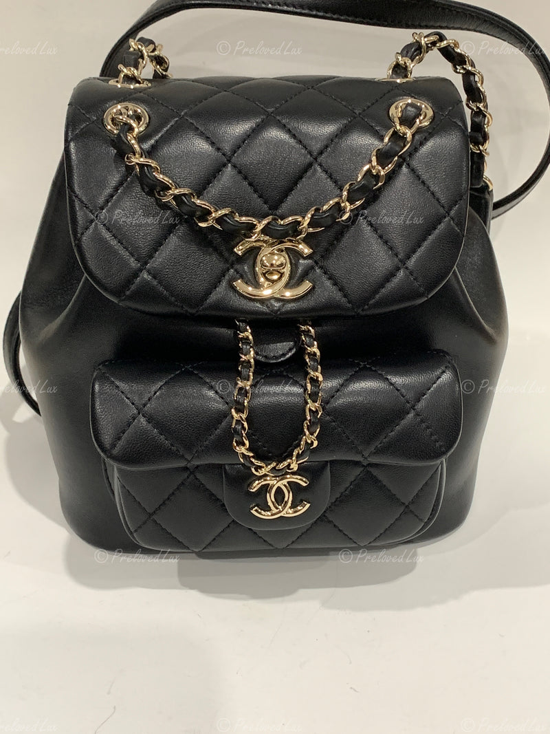 CHANEL Black lambskin Mini Duma Drawstring Backpack / Gold Hardware