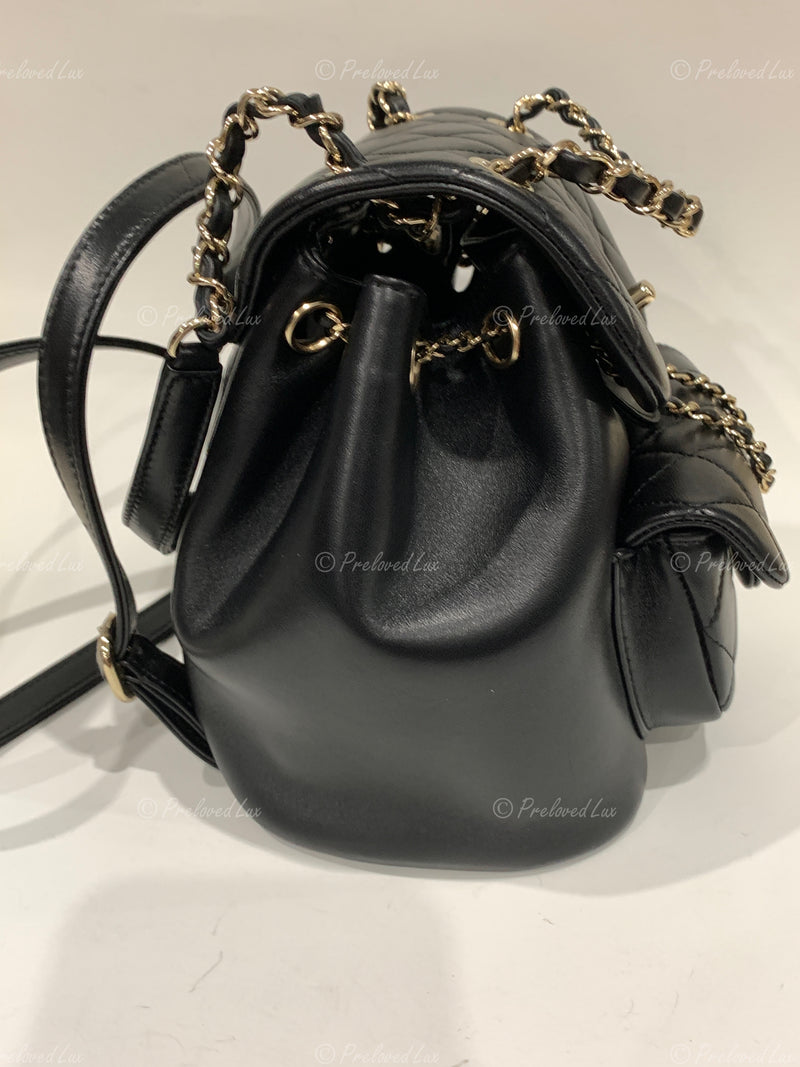 CHANEL Black lambskin Mini Duma Drawstring Backpack / Gold Hardware