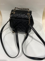 CHANEL Black lambskin Mini Duma Drawstring Backpack / Gold Hardware