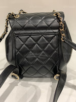 CHANEL Black lambskin Mini Duma Drawstring Backpack / Gold Hardware