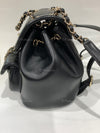 CHANEL Black lambskin Mini Duma Drawstring Backpack / Gold Hardware