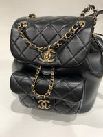 CHANEL Black lambskin Mini Duma Drawstring Backpack / Gold Hardware