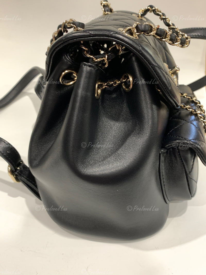 CHANEL Black lambskin Mini Duma Drawstring Backpack / Gold Hardware