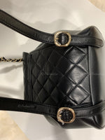 CHANEL Black lambskin Mini Duma Drawstring Backpack / Gold Hardware