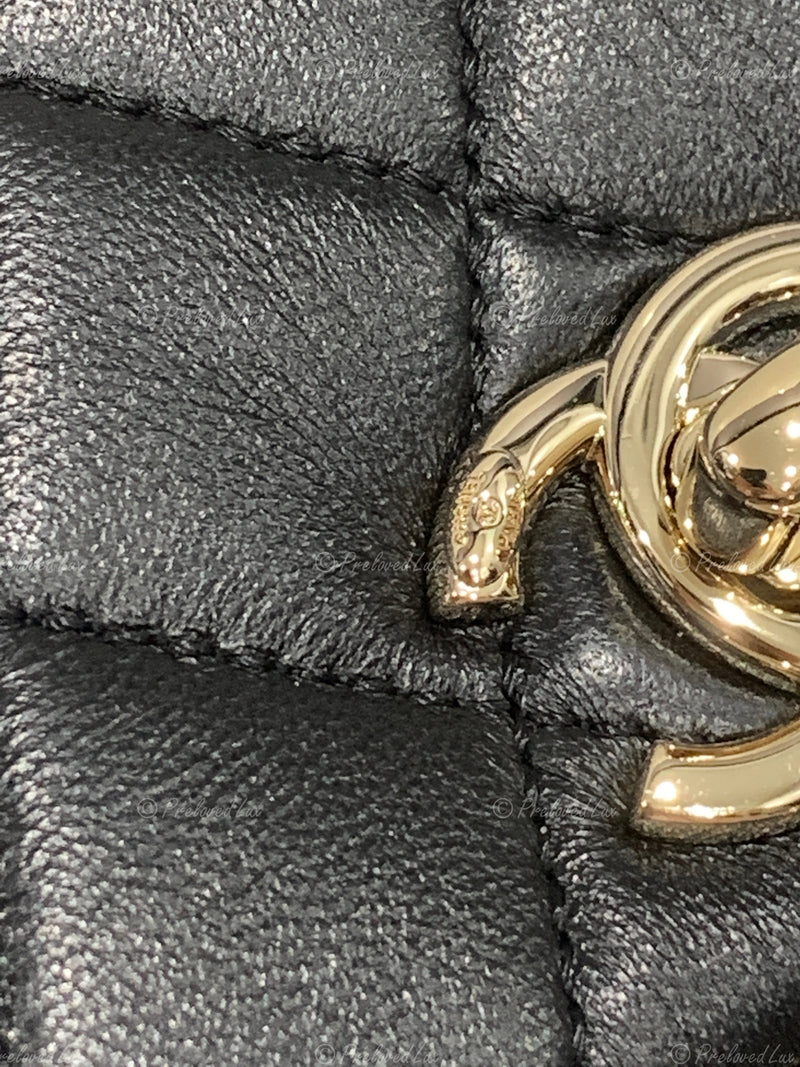 CHANEL Black lambskin Mini Duma Drawstring Backpack / Gold Hardware