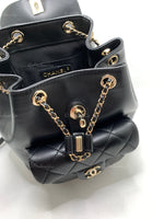 CHANEL Black lambskin Mini Duma Drawstring Backpack / Gold Hardware