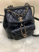 CHANEL Black lambskin Mini Duma Drawstring Backpack / Gold Hardware