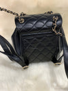 CHANEL Black lambskin Mini Duma Drawstring Backpack / Gold Hardware