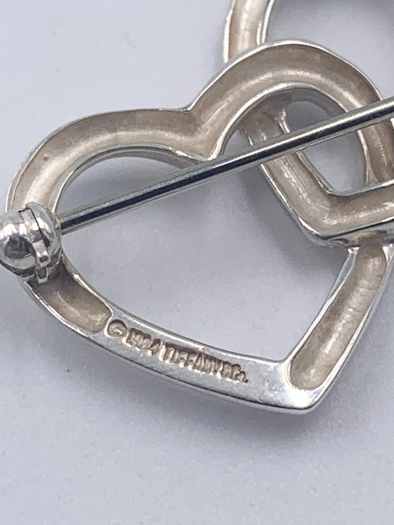 Sold-Tiffany 
Co 925 Silver Triple Heart Brooch