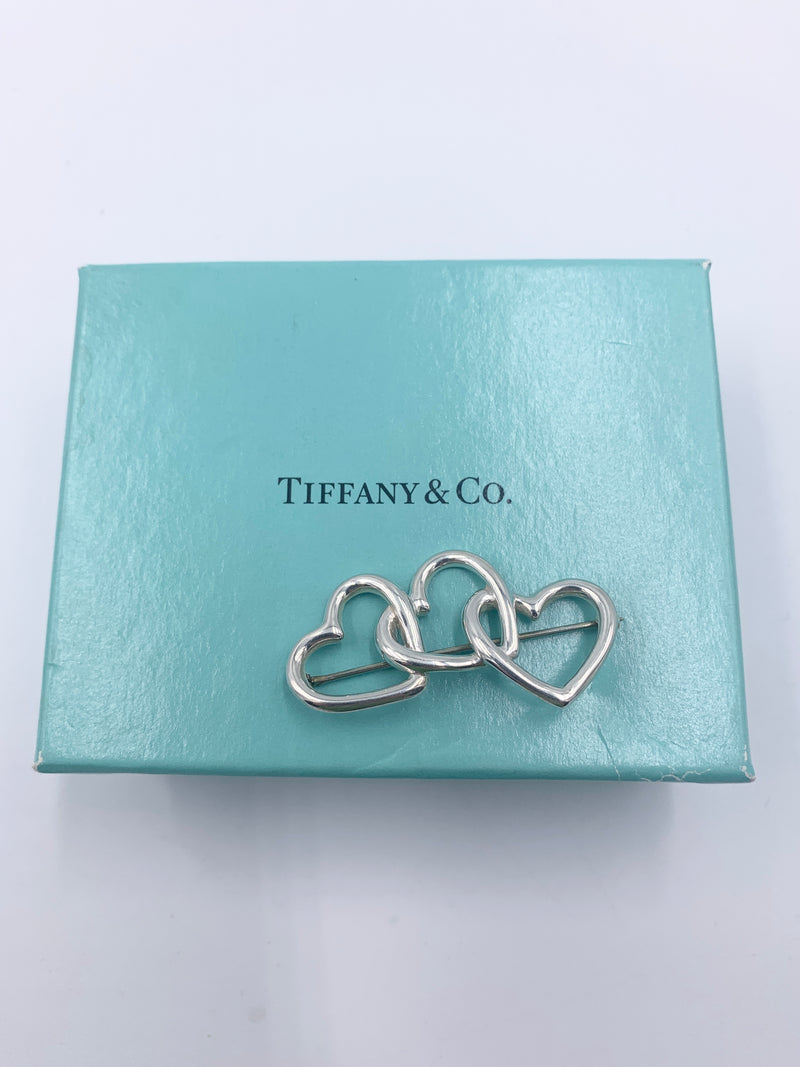 Sold-Tiffany 
Co 925 Silver Triple Heart Brooch