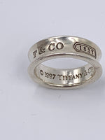 Sold-Tiffany 
Co 925 Silver 1837 Medium Ring Size 7 1/4