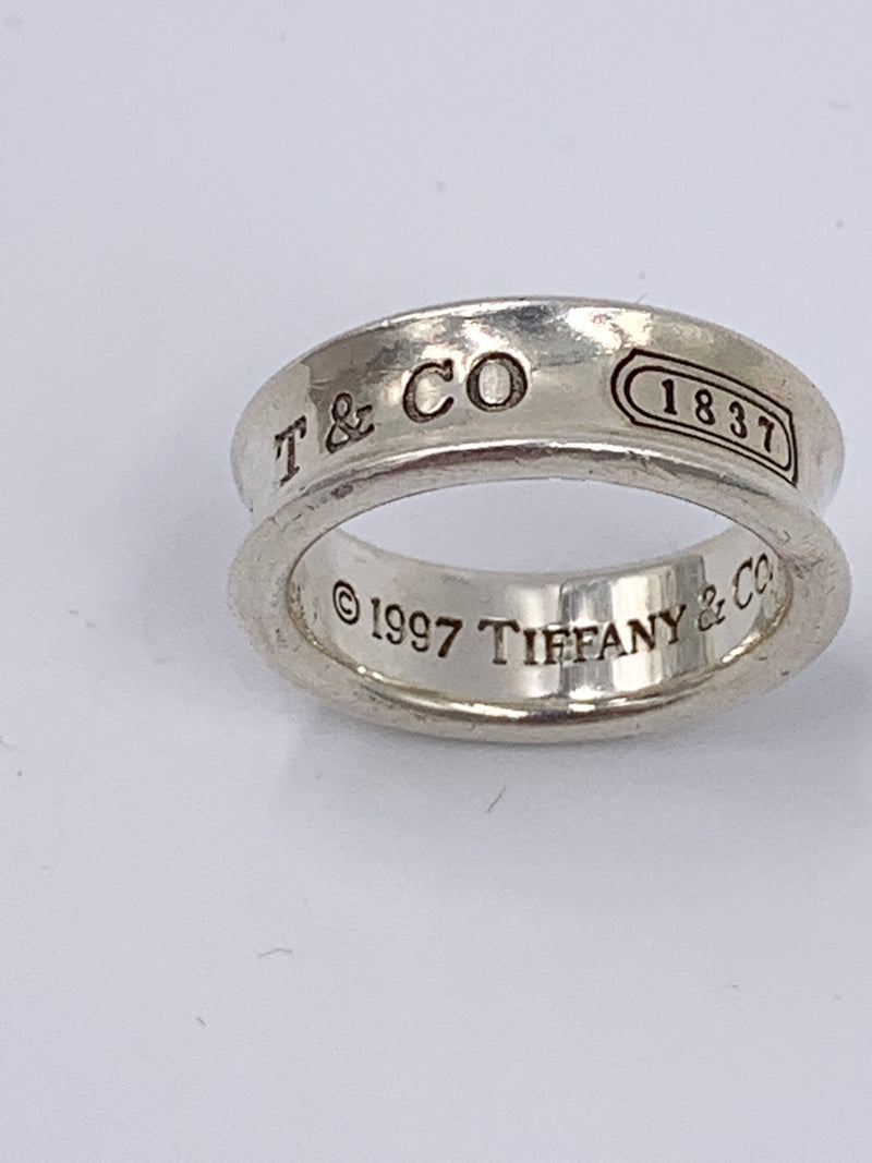 Sold-Tiffany 
Co 925 Silver 1837 Medium Ring Size 7 1/4