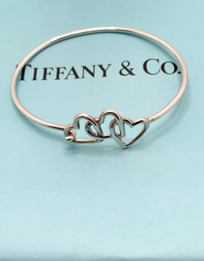 Sold-Tiffany 
Co Silver 925 Open Triple Heart Bangle