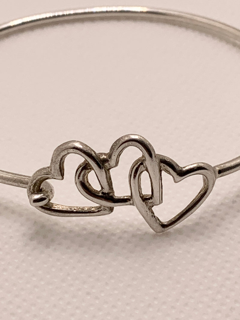 Sold-Tiffany 
Co Silver 925 Open Triple Heart Bangle