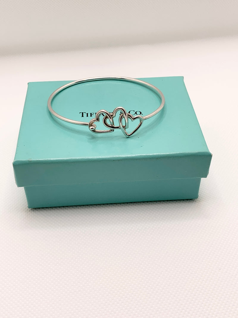 Sold-Tiffany 
Co Silver 925 Open Triple Heart Bangle