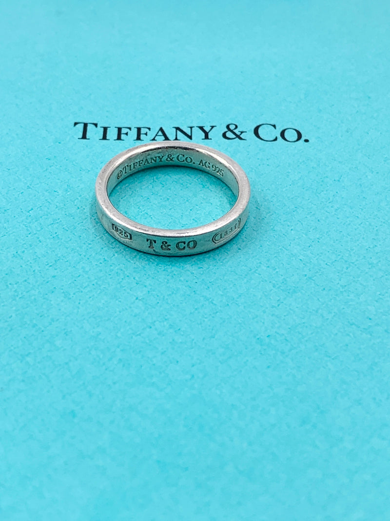 Sold-Tiffany 
Co 925 Silver 1837 Narrow Ring Size 8.75