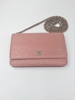 CHANEL CC Camelia Embossed Wallet-on-the-chain Crossbody Bag - Pink